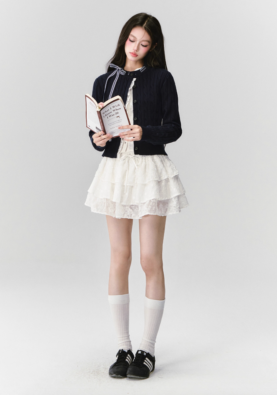 FRENCH CABLE-KNIT BOW CARDIGAN WITH CONTRAST PANELS