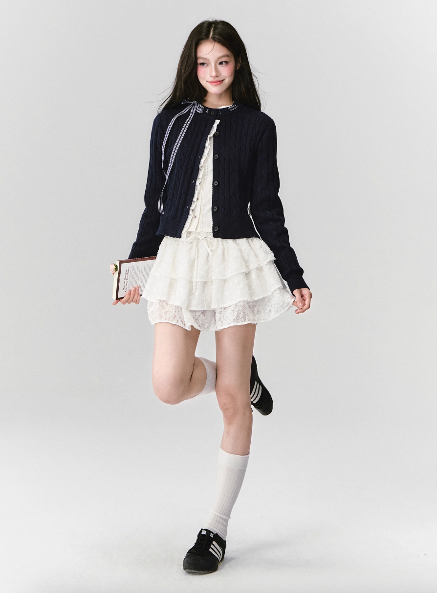 FRENCH CABLE-KNIT BOW CARDIGAN WITH CONTRAST PANELS