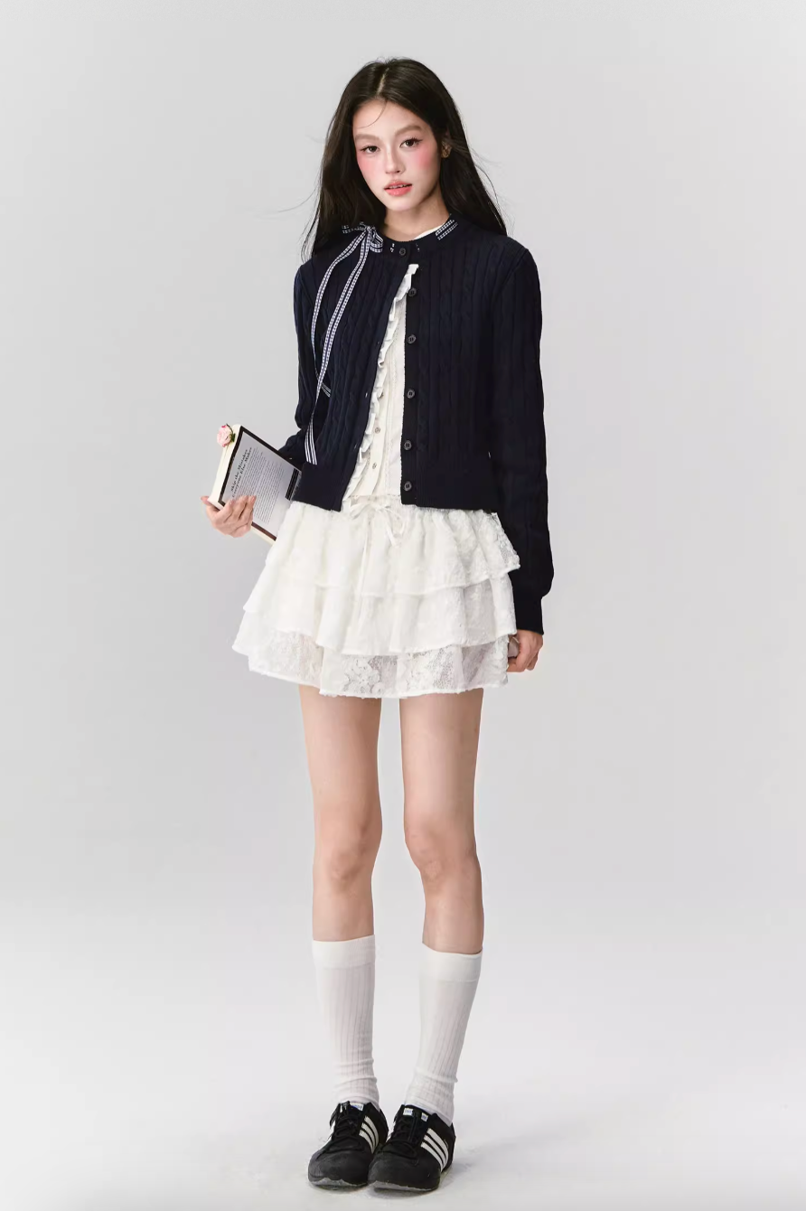 FRENCH CABLE-KNIT BOW CARDIGAN WITH CONTRAST PANELS